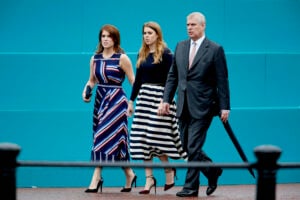Princess Eugenie of York, Princess Beatrice of York and Prince Andrew, Duke of York walk about during "The Patron's Lunch" celebrations for The Queen's 90th birthday at on June 12, 2016 in London, England.