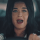Katy Perry sings while driving in the "Bandaids" music video.