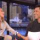 Kelly Ripa and Mark Consuelos laugh together.