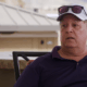 Chuck Potthast on 90 Day Fiance wearing his hat and glasses.