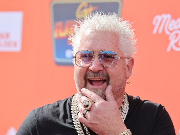 Guy Fieri is interviewed at Guy Fieri's Flavortown Tailgate on February 12, 2023 in Glendale, Arizona.