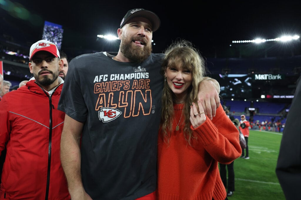 Travis Kelce #87 of the Kansas City Chiefs celebrates with Taylor Swift after a 17-10 victory against the Baltimore Ravens in the AFC Championship Game at M&T Bank Stadium on January 28, 2024 in Baltimore, Maryland.