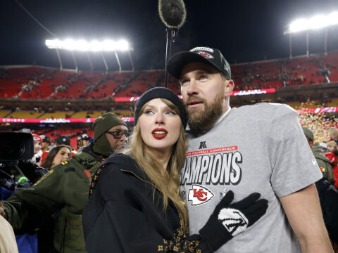 Taylor Swift celebrates with Travis Kelce #87 of the Kansas City Chiefs after defeating the Buffalo Bills 32-29 in the AFC Championship Game at GEHA Field at Arrowhead Stadium on January 26, 2025 in Kansas City, Missouri.