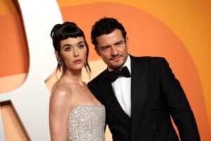 US singer Katy Perry (L) and English actor Orlando Bloom attend the Vanity Fair Oscar Party at the Wallis Annenberg Center for the Performing Arts in Beverly Hills, California, on March 2, 2025.