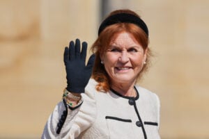 Sarah Ferguson waves as she attends the Easter Matins Service at St. George's Chapel, Windsor Castle on April 20, 2025 in Windsor, England.