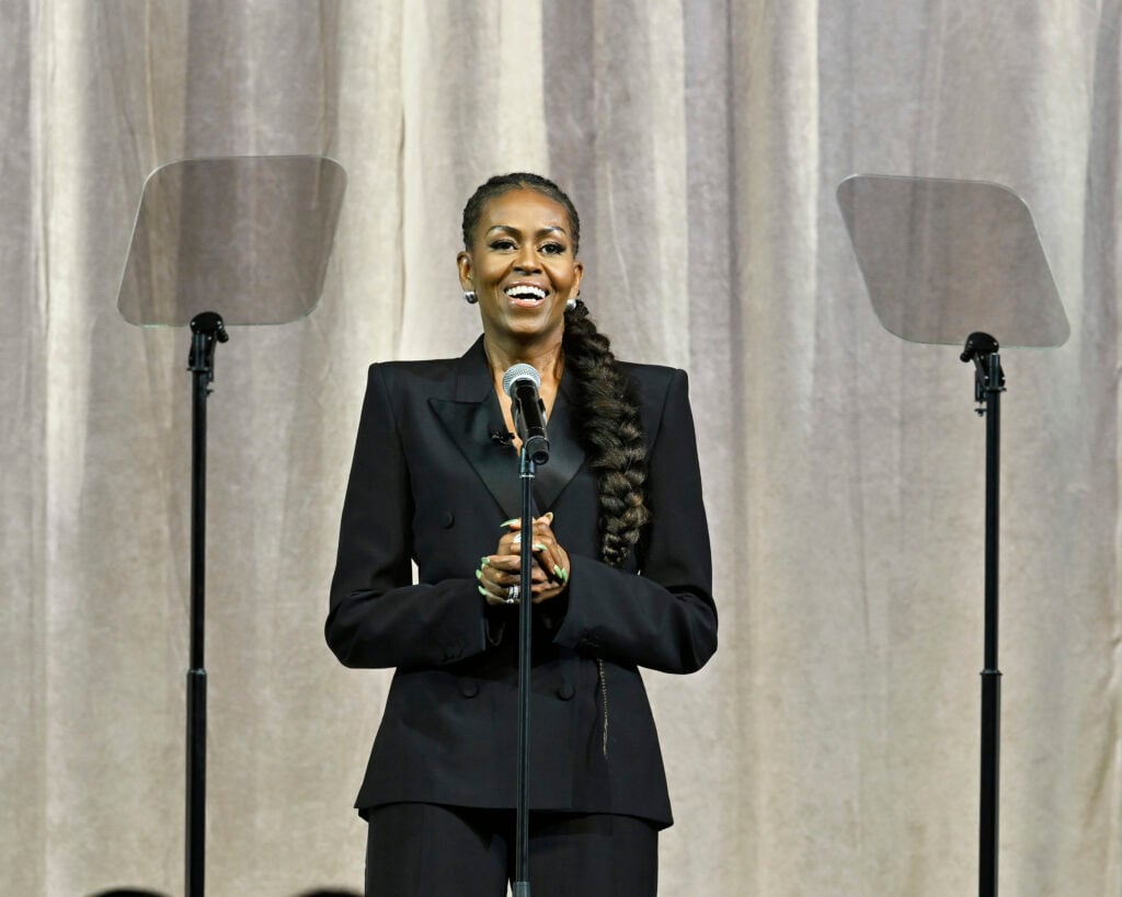 Former First Lady Michelle Obama welcomes the audience at Matriarch - An Evening with Tina Knowles at The Theater at MGM National Harbor on April 30, 2025 in National Harbor, Maryland.