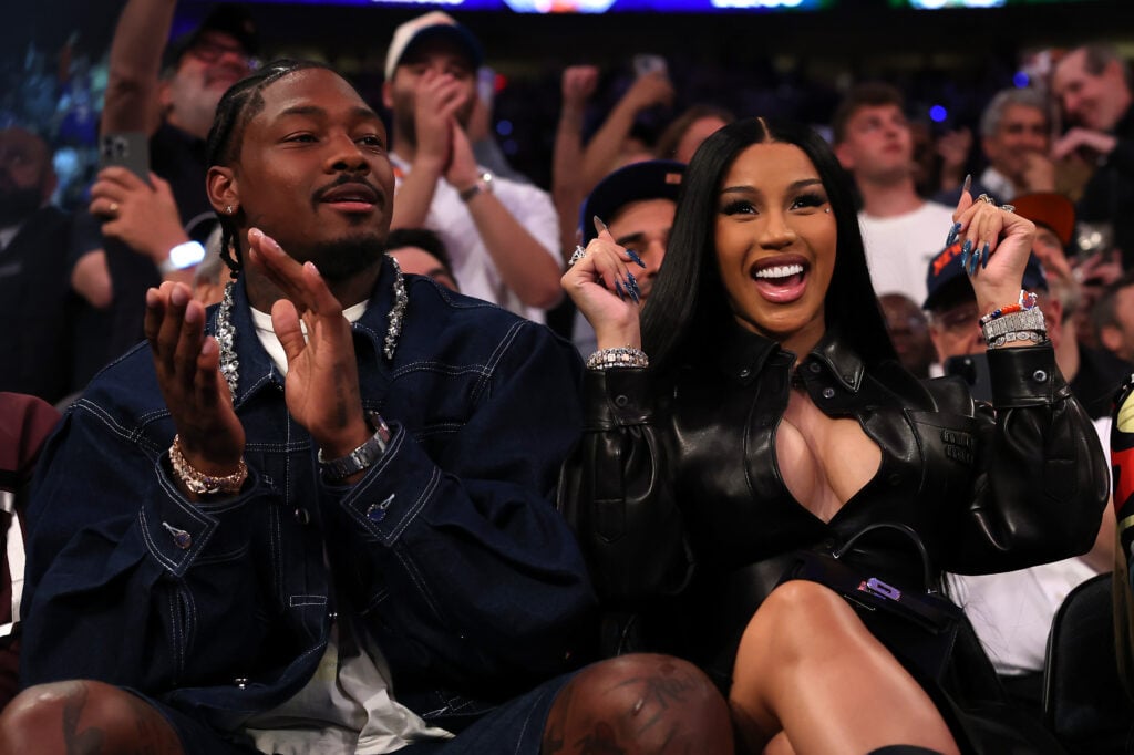 NFL Player Stefon Diggs and rapper Cardi B sits court-side during the first quarter in Game Four of the Eastern Conference Second Round NBA Playoffs between the Boston Celtics and the New York Knicks at Madison Square Garden on May 12, 2025 in New York City.