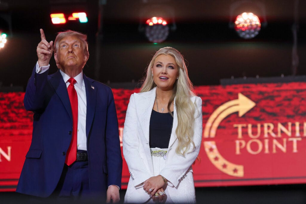 Erika Kirk joins U.S. President Donald Trump onstage during the memorial service for political activist Charlie Kirk at State Farm Stadium on September 21, 2025 in Glendale, Arizona.