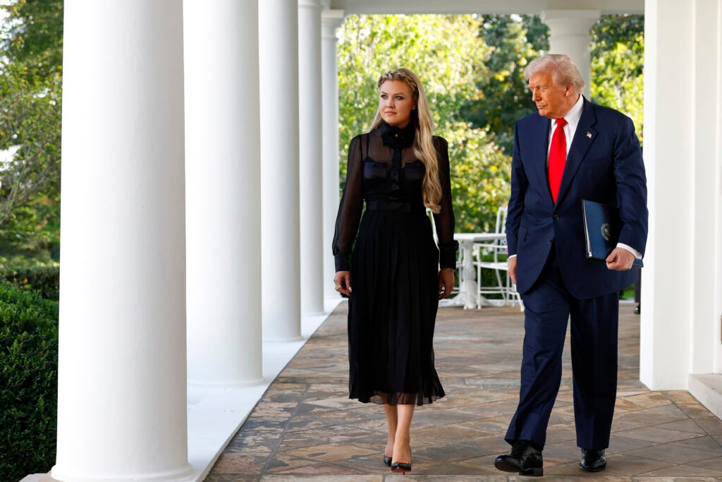 Erika Kirk (L), wife of late conservative activist Charlie Kirk, arrives with U.S. President Donald Trump as he posthumously awards the Presidential Medal of Freedom to Charlie Kirk during a ceremony in the Rose Garden of the White House on October 14, 2025 in Washington, DC. 
