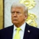 U.S. President Donald Trump looks on during a press conference in the Oval Office of the White House on October 15, 2025 in Washington, DC. Trump and Federal Bureau of Investigation Director Kash Patel provided an update on the Trump administration’s progress in reducing violent crime.