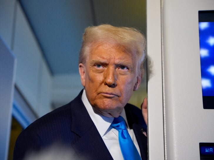 U.S. President Donald Trump speaks to journalists aboard Air Force One en route to South Korea on October 29, 2025 in Japan.