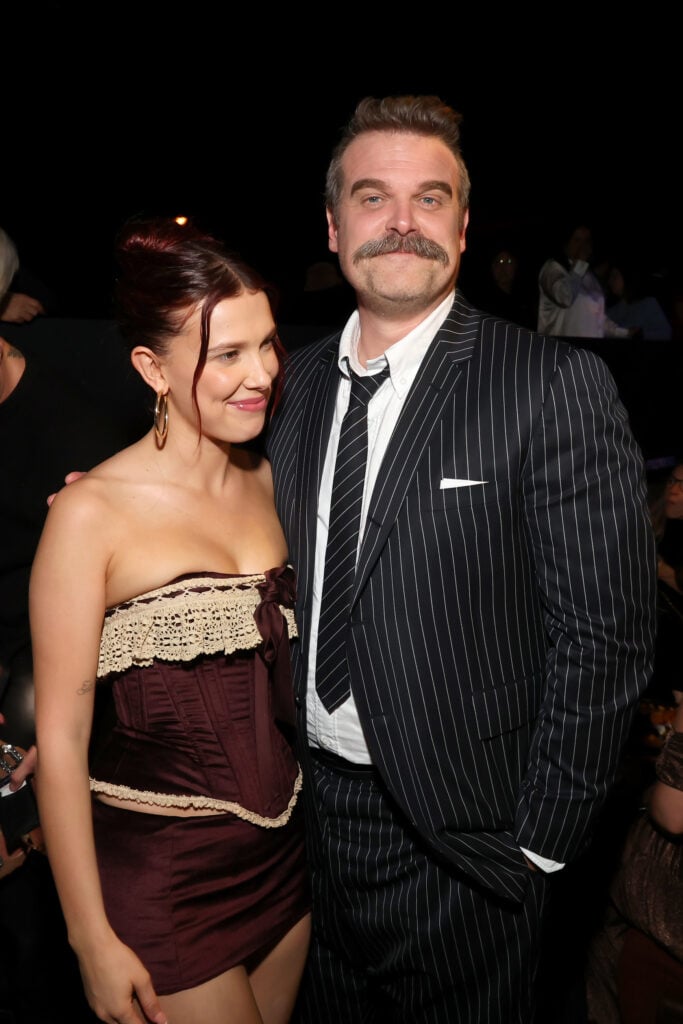 Millie Bobby Brown and David Harbour attend Netflix's "Stranger Things" Season 5 World Premiere at TCL Chinese 6 Theatres on November 06, 2025 in Hollywood, California.