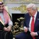 U.S. President Donald Trump (R) jokes with Crown Prince and Prime Minister Mohammed bin Salman of Saudi Arabia during a bilateral meeting in the Oval Office of the White House on November 18, 2025 in Washington, DC.