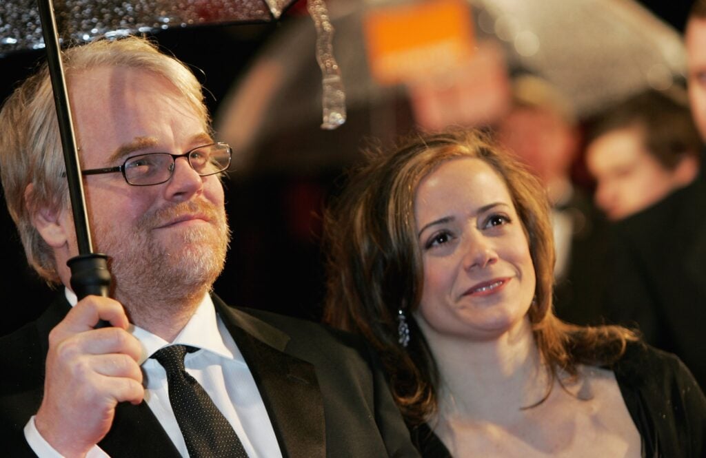 Actor Philip Seymour Hoffman and girlfriend Mimi O'Donnell arrive at The Orange British Academy Film Awards (BAFTAs) at the Odeon Leicester Square on February 19, 2006 in London, England. 