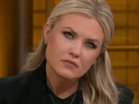 Erika Kirk tilts her head to the side.