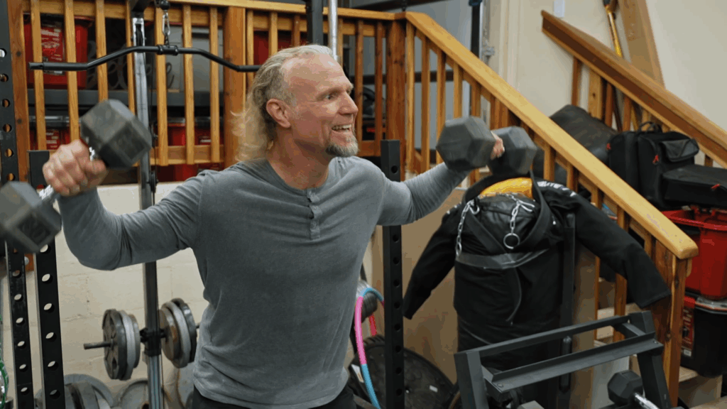 Kody Brown works out at home.