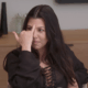 Kourtney Kardashian gestures to her third eye.
