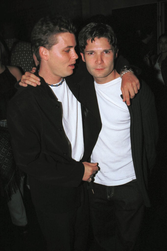 Actors Corey Haim and Corey Feldman pose outside Las Palmas club October 17, 2001 in Hollywood, CA.