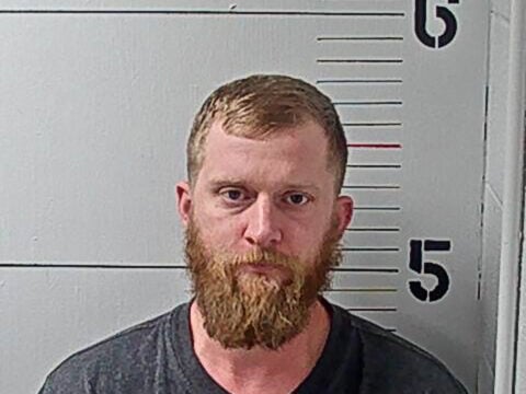 In this handout photo provided by the Rutherford County Adult Detention Center, Kyle Chrisley is seen in a police booking photo at the Rutherford County Adult Detention Center after his arrest by the Smyrna, Tennessee Police Department on charges for aggravated assault on March 14, 2023 in Murfreesboro, Tennessee.