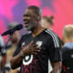 Brian McKnight sings the United States National Anthem prior to the MLS All-Star Game between Arsenal FC and MLS All-Stars at Audi Field on July 19, 2023 in Washington, DC.