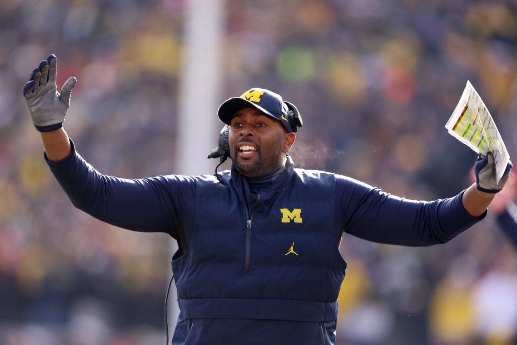 Head coach Sherrone Moore of the Michigan Wolverines celebrates a touchdown against the Ohio State Buckeyes during the first quarter in the game at Michigan Stadium on November 25, 2023 in Ann Arbor, Michigan.