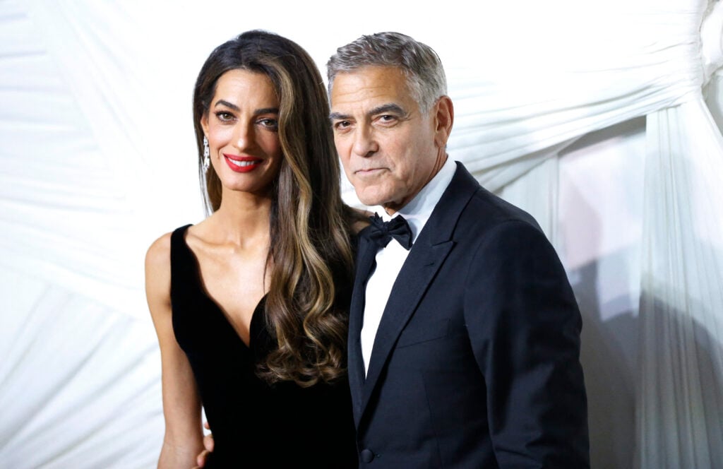 US actor George Clooney and his wife Lebanese-British barrister Amal Clooney arrive for "The Albies" hosted by the Clooney Foundation for Justice at the New York Public Library in New York, September 26, 2024. 