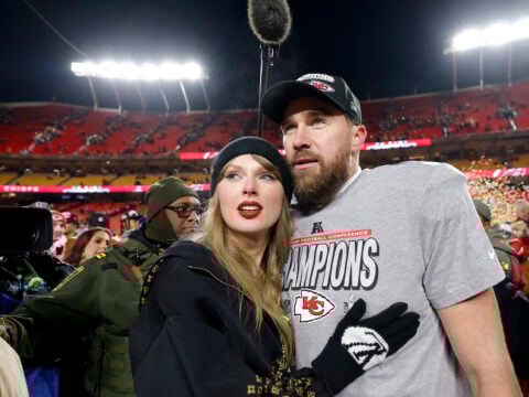 Taylor Swift celebrates with Travis Kelce #87 of the Kansas City Chiefs after defeating the Buffalo Bills 32-29 in the AFC Championship Game at GEHA Field at Arrowhead Stadium on January 26, 2025 in Kansas City, Missouri.