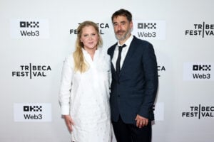 Amy Schumer and Chris Fischer attend the "Room To Move" premiere during the 2025 Tribeca Festival at SVA Theater on June 11, 2025 in New York City.
