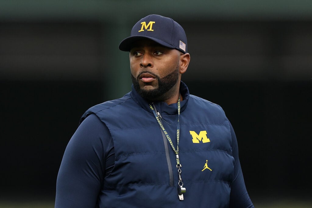 Head coach Sherrone Moore of the Michigan Wolverines looks on prior to the game against the Northwestern Wildcats at Wrigley Field on November 15, 2025 in Chicago, Illinois.