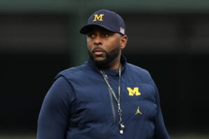 Head coach Sherrone Moore of the Michigan Wolverines looks on prior to the game against the Northwestern Wildcats at Wrigley Field on November 15, 2025 in Chicago, Illinois.