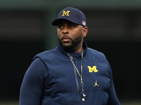 Head coach Sherrone Moore of the Michigan Wolverines looks on prior to the game against the Northwestern Wildcats at Wrigley Field on November 15, 2025 in Chicago, Illinois.