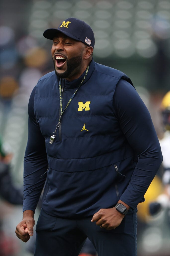Head coach Sherrone Moore of the Michigan Wolverines looks on prior to the game against the Northwestern Wildcats at Wrigley Field on November 15, 2025 in Chicago, Illinois.