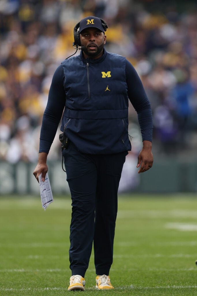 Head coach Sherrone Moore of the Michigan Wolverines looks on against the Northwestern Wildcats during the first half at Wrigley Field on November 15, 2025 in Chicago, Illinois.