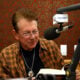 Joe Ely reads from his new book "Reverb" while visiting Mojo Nixon in Celebration of his 10 Year Anniversary On SiriusXM with A special live show at the SiriusXM Studios on November 12, 2014 in Austin, Texas.