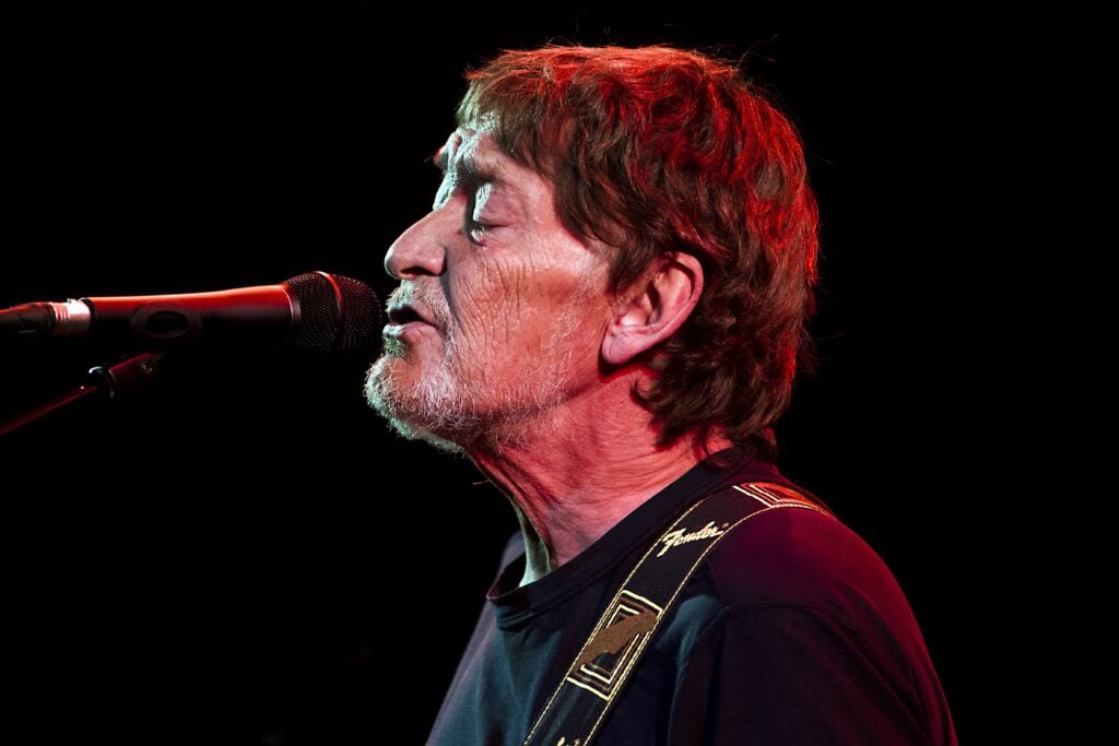 British singer Chris Rea peforms during a concert in theater Carre on November 24, 2014 in Amsterdam. 