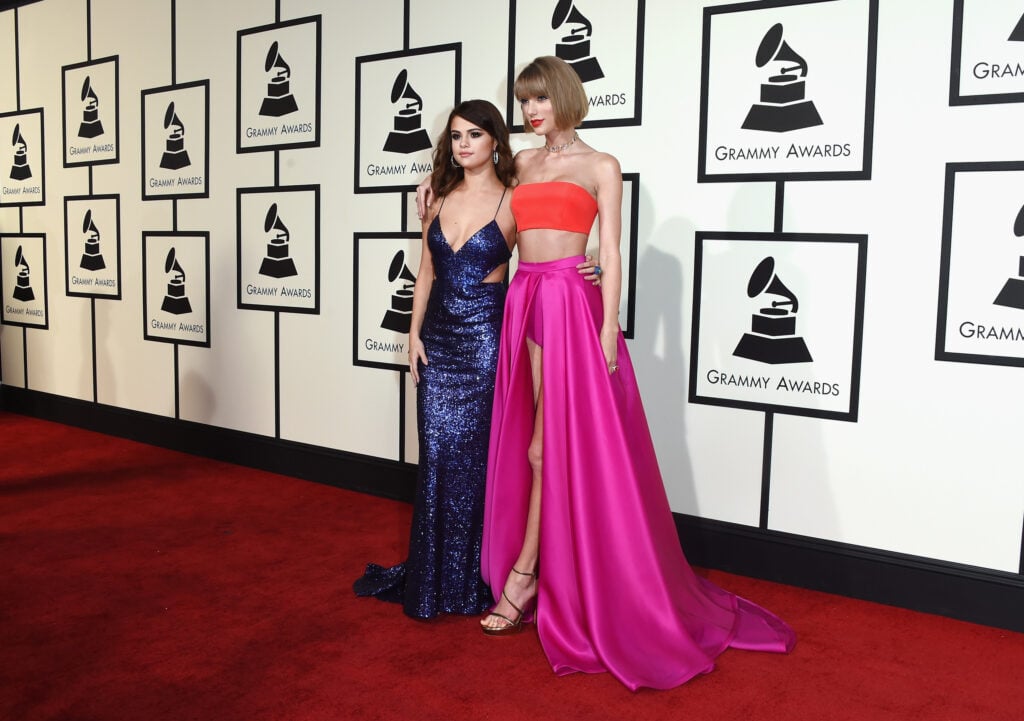 Musicians Selena Gomez (L) and Taylor Swift attend The 58th GRAMMY Awards at Staples Center on February 15, 2016 in Los Angeles, California.