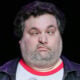 Comedian, actor and radio personality Artie Lange makes a face as he performs his stand-up comedy routine at the Mandalay Bay Theatre February 1, 2008 in Las Vegas, Nevada.