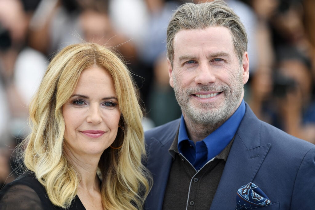 Kelly Preston and John Travolta attend the photocall for "Rendezvous With John Travolta - Gotti" during the 71st annual Cannes Film Festival at Palais des Festivals on May 15, 2018 in Cannes, France.