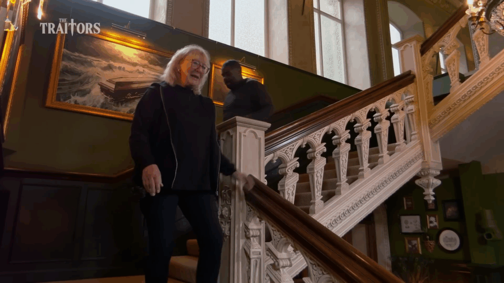 Donna Kelce descends stairs on 'The Traitors'