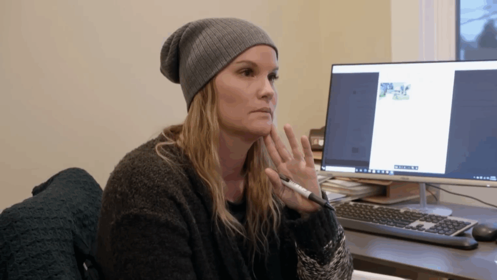 Leslie Davis in front of a computer.