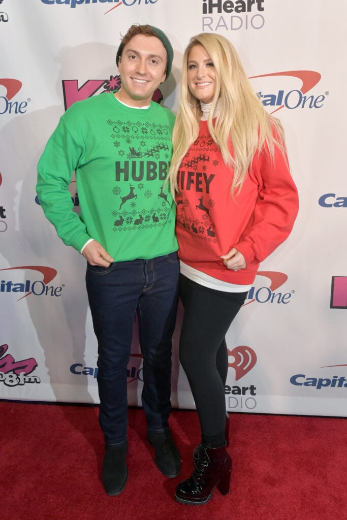Daryl Sabara (L) and Meghan Trainor attend KISS 108's Jingle Ball 2018 at TD Garden on December 4, 2018 in Boston, Massachusetts.  