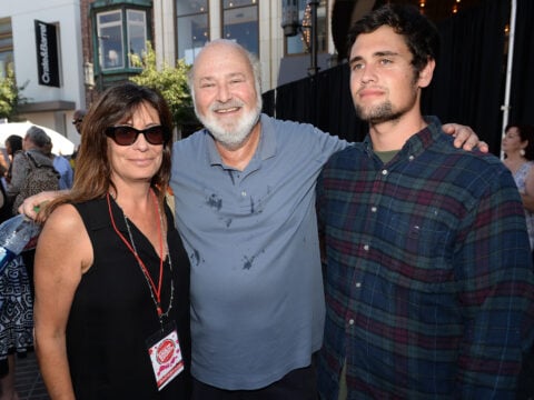 Actor/Producer/Director Rob Reiner (center) and wife Michele Singer (L) and son Nick Reiner (R) attend Teen Vogue's Back-to-School Saturday kick-off event at The Grove on August 9, 2013 in Los Angeles, California.