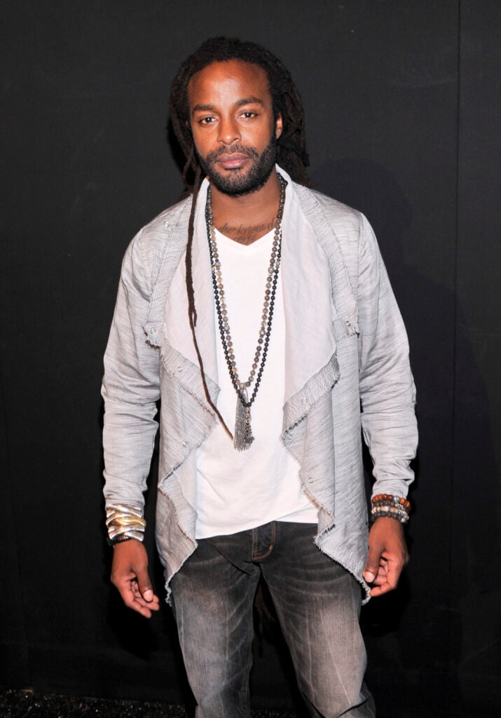 Musician John Forte poses backstage at the Nanette Lepore fashion show during Mercedes-Benz Fashion Week Spring 2014 at The Stage at Lincoln Center on September 11, 2013 in New York City.  