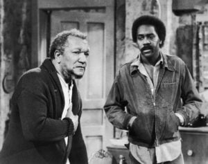 American actors Red Foxx (1922 - 1991) (left) Demond Wilson in a still from the television series, 'Sanford And Son,' c. 1974.