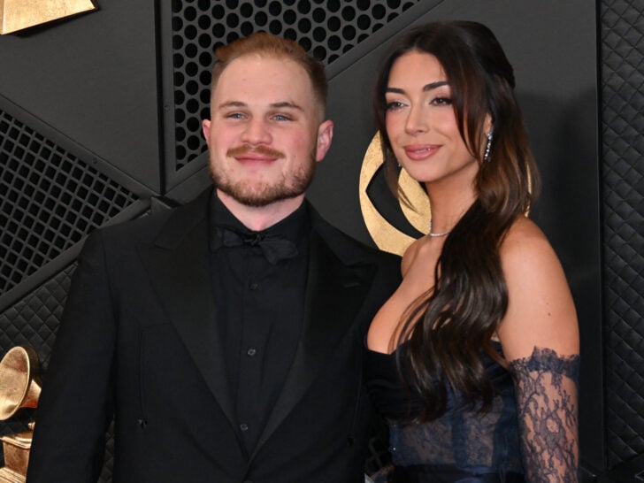 US country musician Zach Bryan and girlfriend Brianna Chickenfry arrives for the 66th Annual Grammy Awards at the Crypto.com Arena in Los Angeles on February 4, 2024.