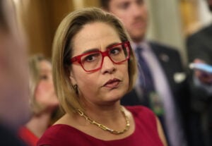 Kyrsten Sinema Accused of Drug-Fueled Affair with Married Bodyguard