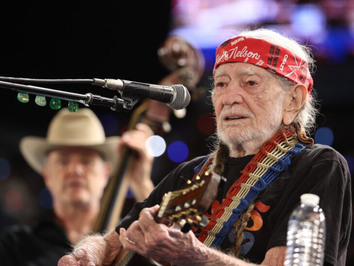 Musician Willie Nelson performs during a campaign rally with Democratic presidential nominee, U.S. Vice President Kamala Harris, at Shell Energy Stadium on October 25, 2024 in Houston, Texas.