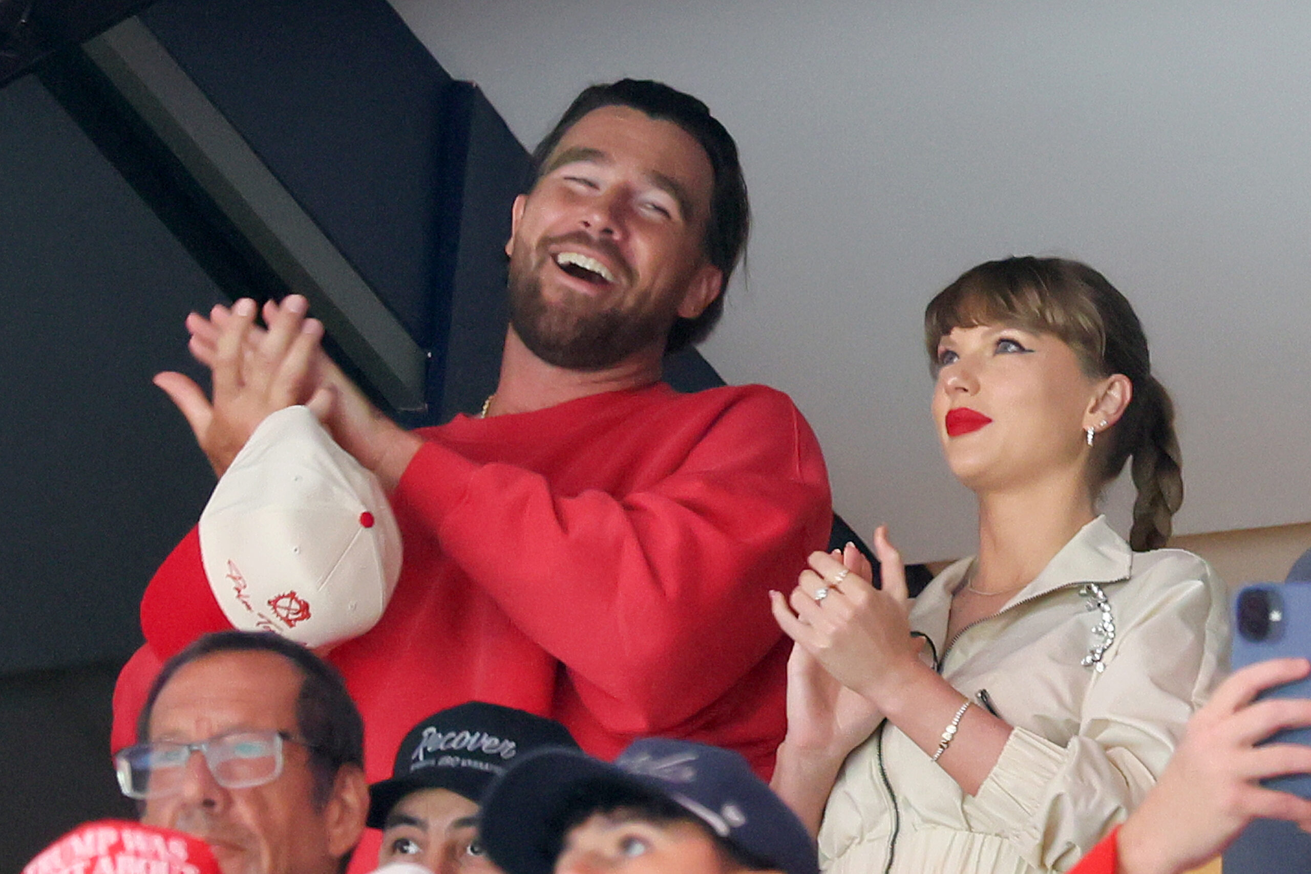 Travis Kelce, left, and Taylor Swift react as the Edmonton Oilers and Florida Panthers play during the first period of Game 4 of the 2025 Stanley Cup Final at Amerant Bank Arena on June 12, 2025 in Sunrise, Florida.