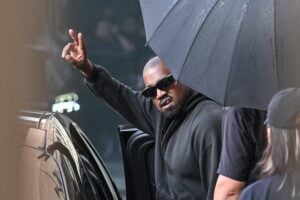 US rapper and producer Kanye West gestures upon arriving at Shanghai Pudong International Airport on July 11, 2025. Kanye West will hold a concert in Shanghai on July 12.