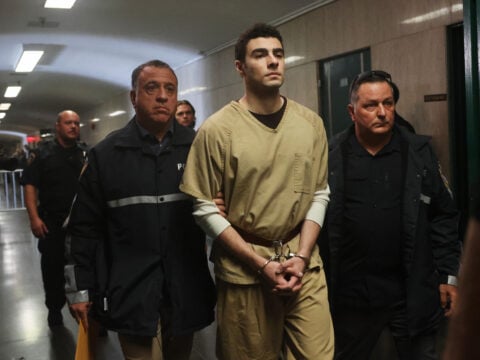 Luigi Mangione is escorted by police as he arrives for a hearing as his lawyers push to have his state murder charges dismissed in the killing of UnitedHealthcare CEO Brian Thompson, at Manhattan Criminal Court on September 16, 2025 in New York City.